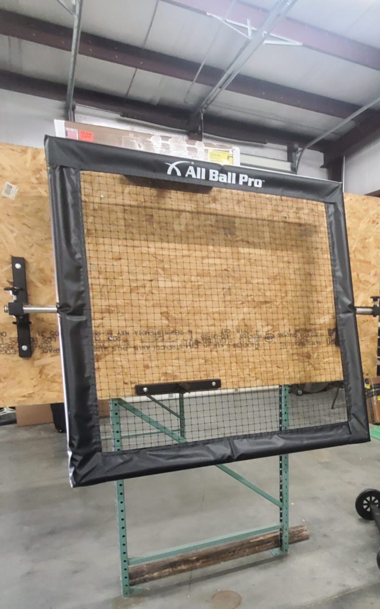 Varsity returner ball mounted on wall using All Ball Pro system installation