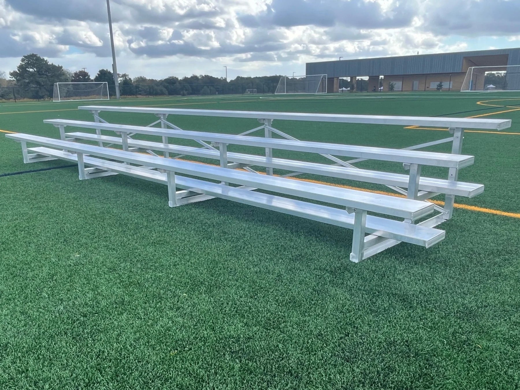Professional PEVO 3-row aluminum bleacher seating for soccer fields, capacity up to 30 spectators