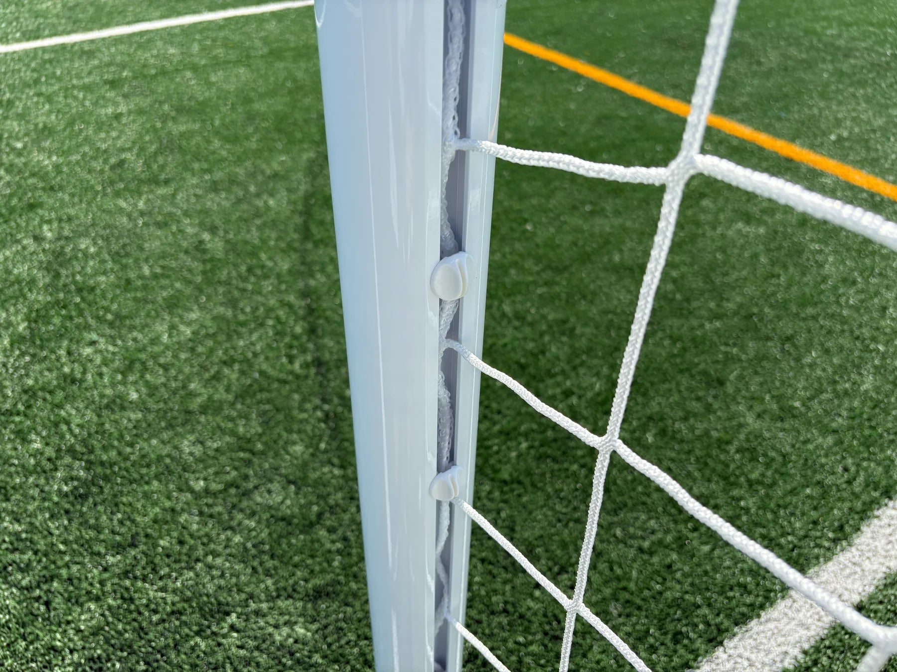 MP channel clips showing twist-lock mechanism for secure net placement in channel system
