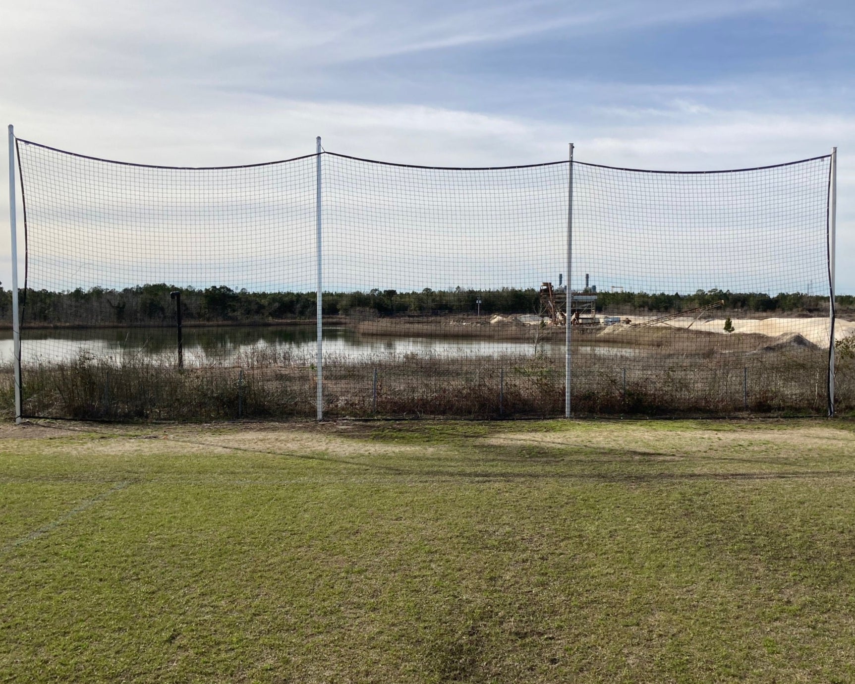 Pevo Multi-Sport Backstop Netting System: Pevo backstop angle view professional soccer equipment