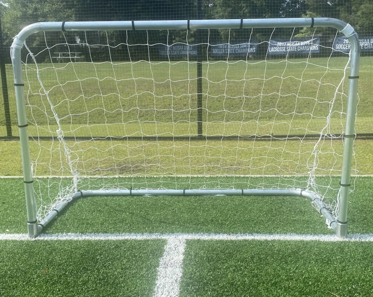 Compact youth soccer goal 4x6 built from 2-inch aluminum tubing, ideal for 3v3 training games