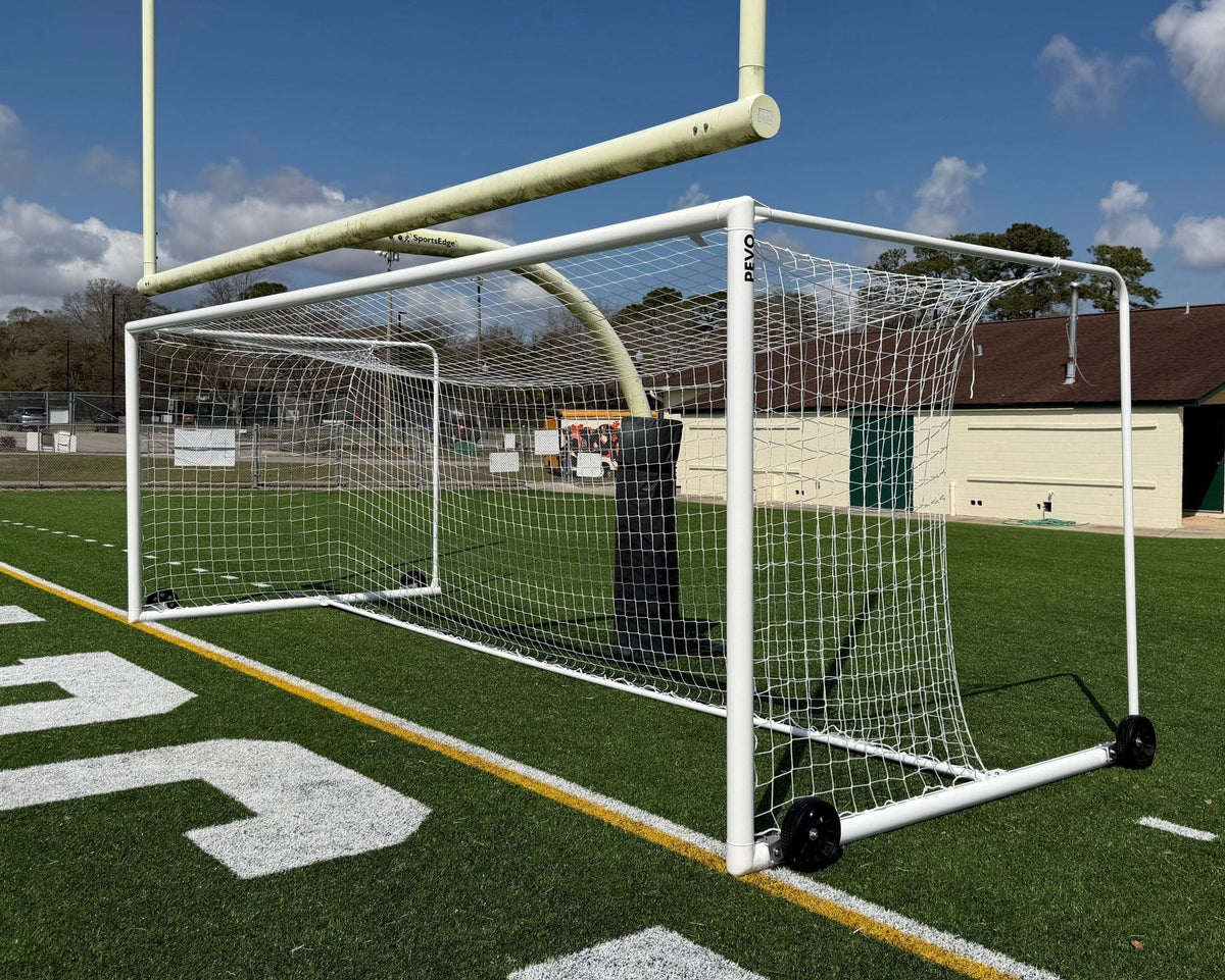 Stadium series soccer goal on field showing multi-use football field installation
