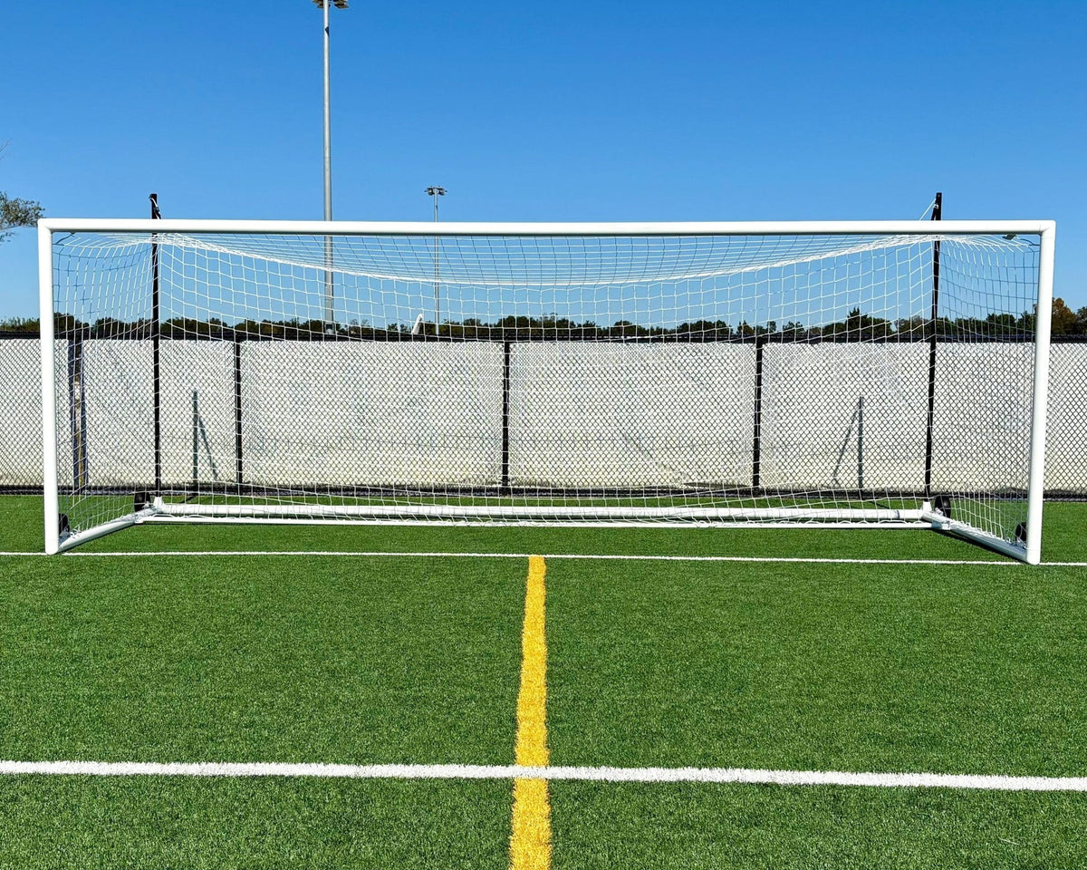 Professional PEVO Stadium Series portable soccer goal with boxed net design and flat-free wheels