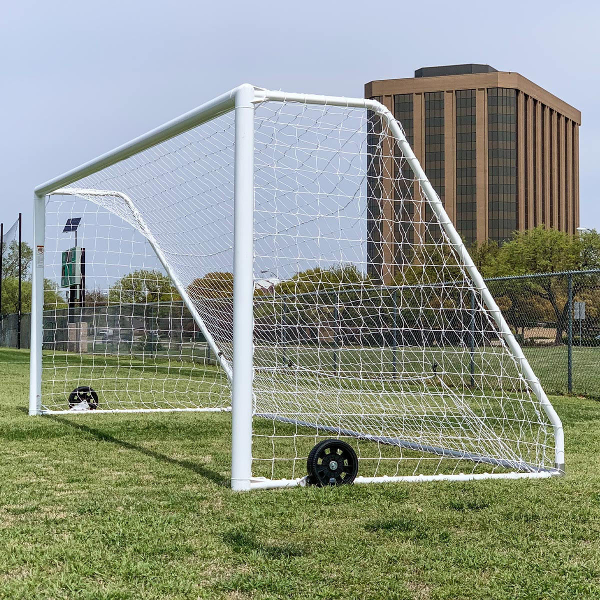 6.5x18.5 Premier Pro soccer goal from angle showing aluminum frame and net