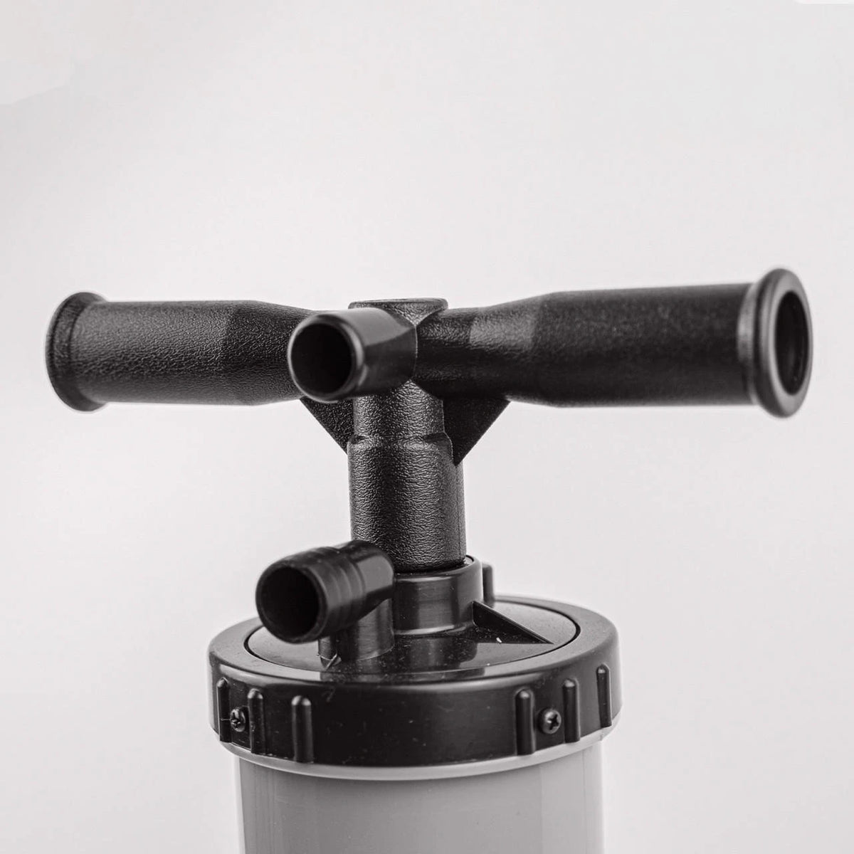 Manual air pump for inflatable BUD training mannequin with quick release for team training and practice