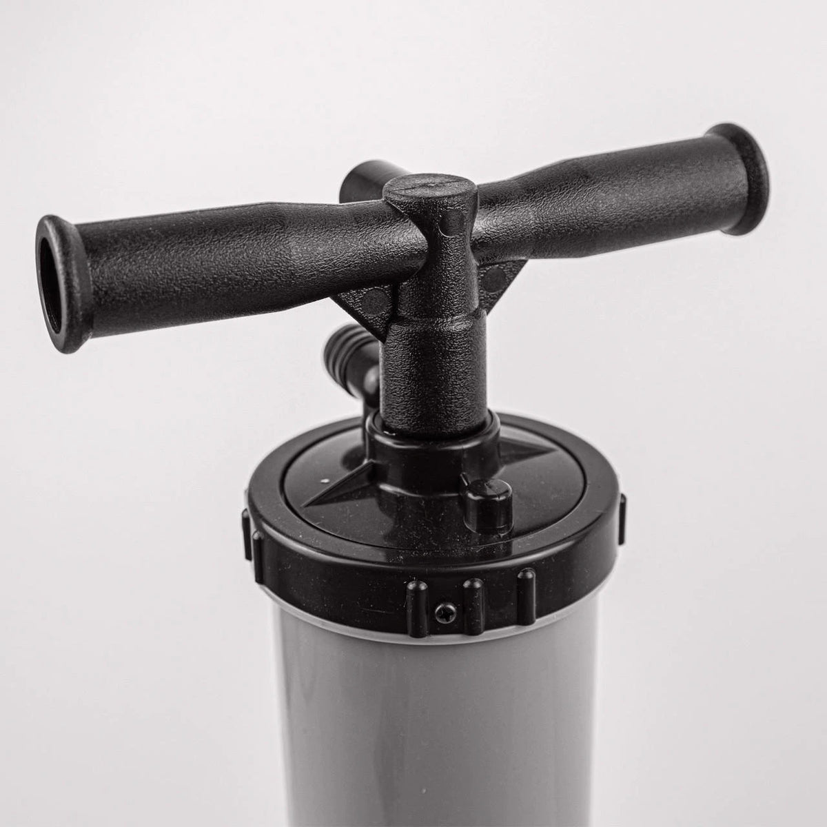Manual air pump for inflatable BUD training mannequin with quick release for team training and practice