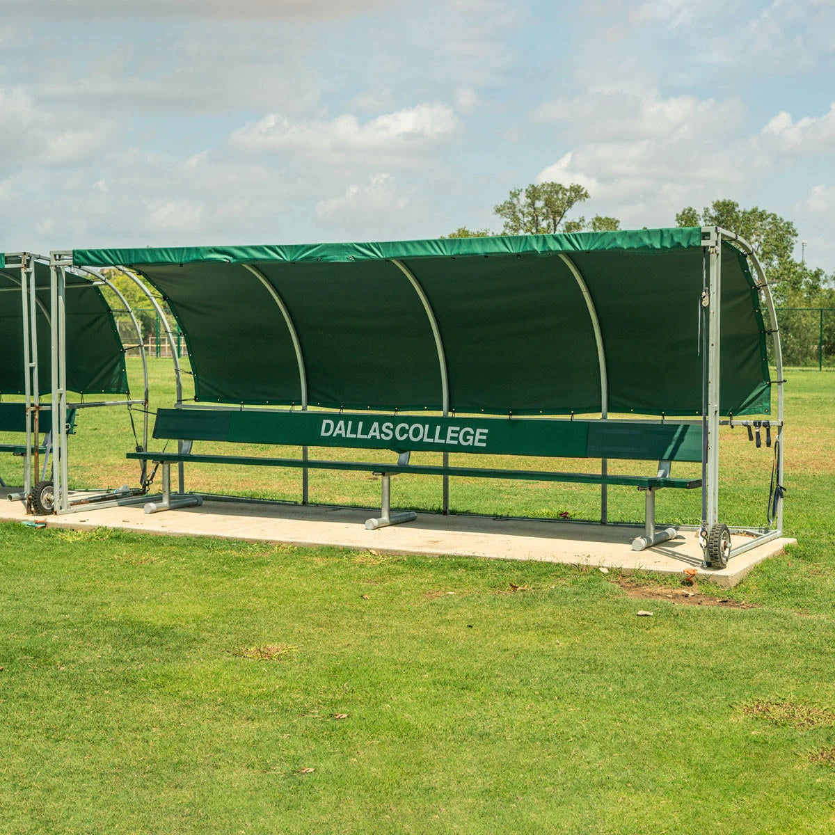MVP team shelter with summer top cover providing sideline shade on soccer field