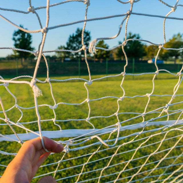 Close-up of Patch-A-Net showing 3-inch square repair patches for goal nets