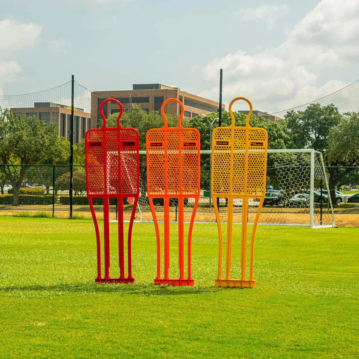 Soccer wall training mannequin with wind-resistant mesh body and telescoping pole