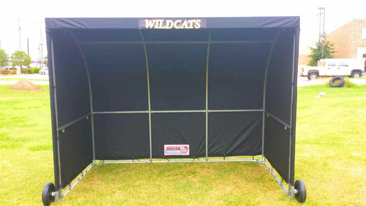 Referee shelter structure showing assembly and professional sideline infrastructure setup