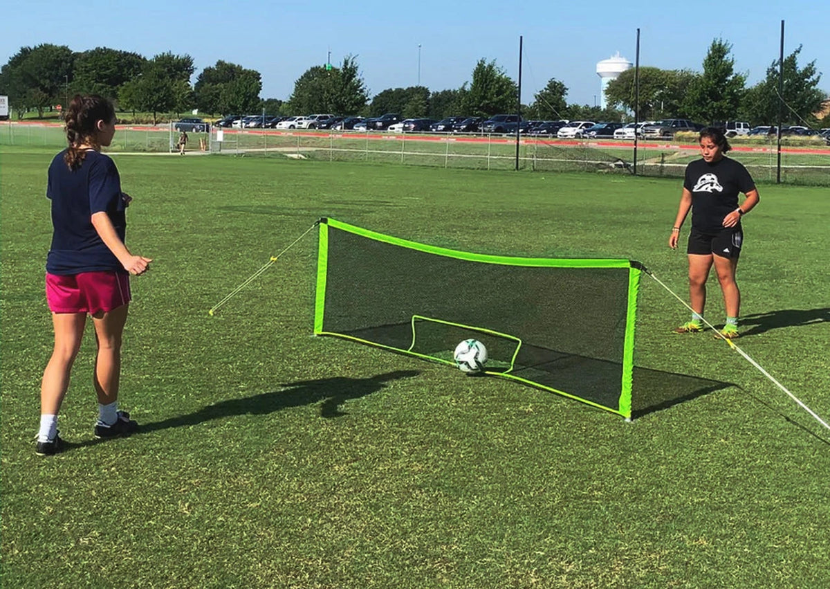 Soccer skills net players training showing real-world application for soft touch skill development