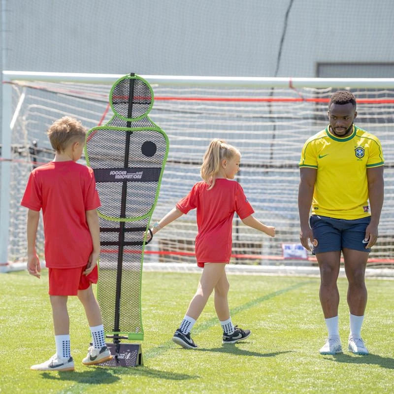 Youth-sized soccer wall training mannequin in black with spring-loaded base for team training and practice