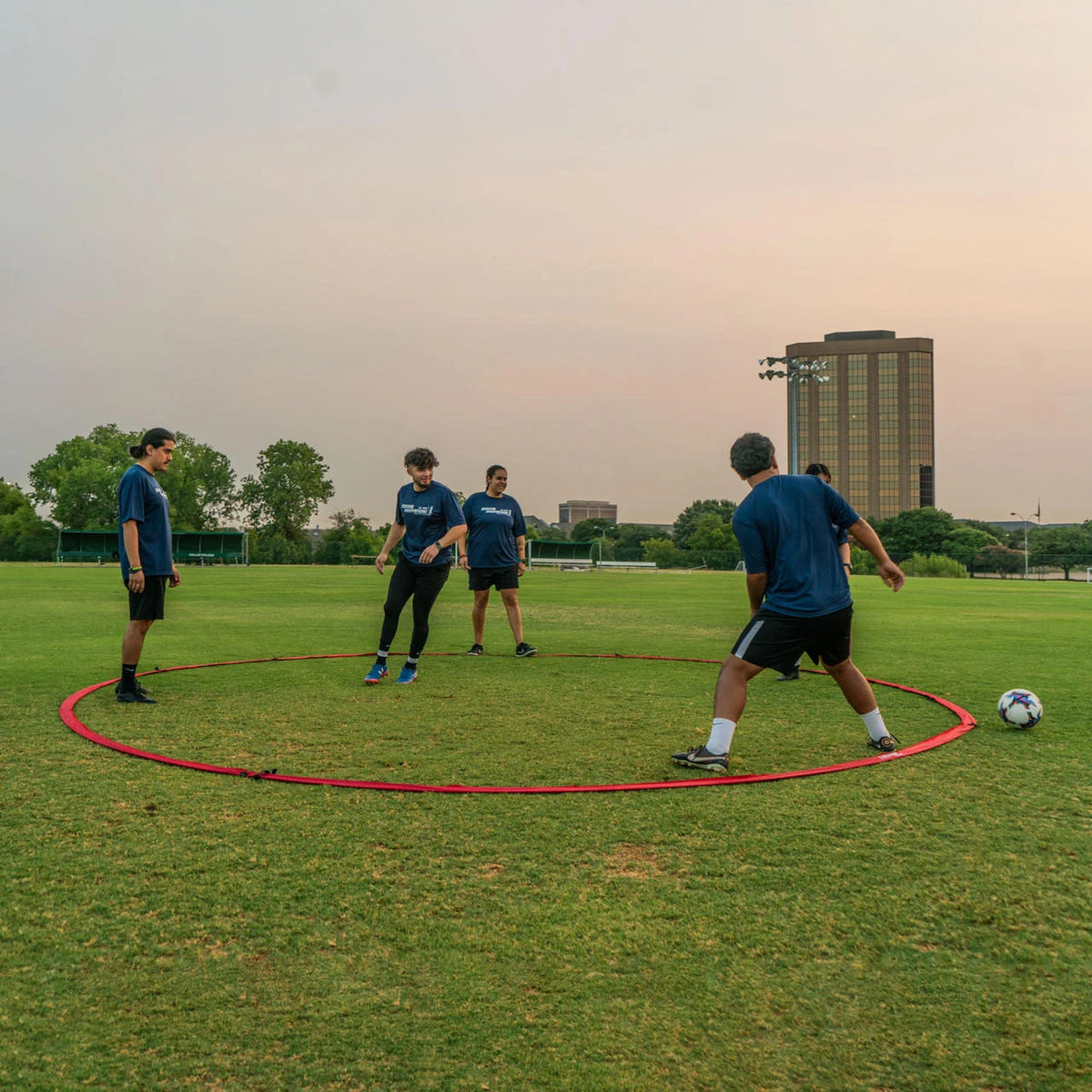 Tiki taka ring setup showing confined training circle for pressure possession and passing drill