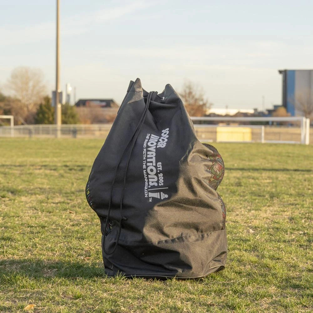 Soccer ball bag backpack with carry straps on neutral background, three-quarter product view